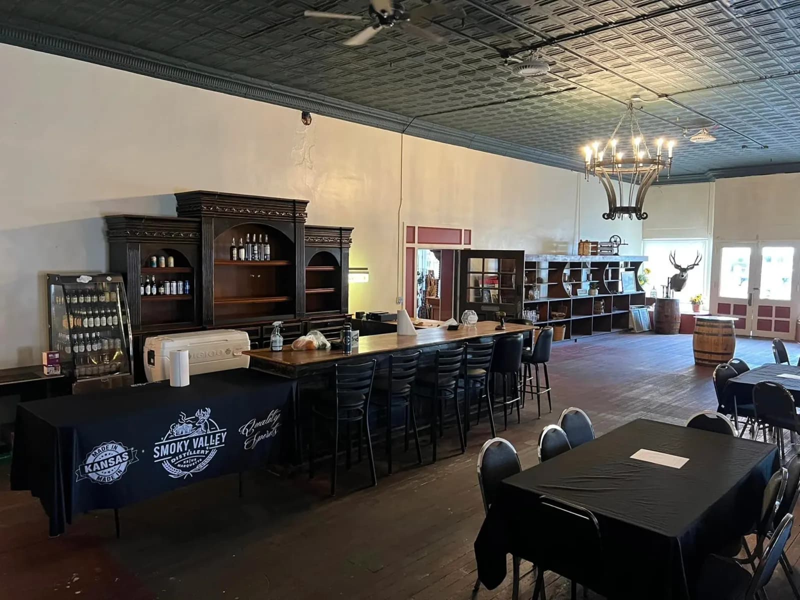 Inside Smoky Valley Distillery — copper still and distilling equipment during a guided tour